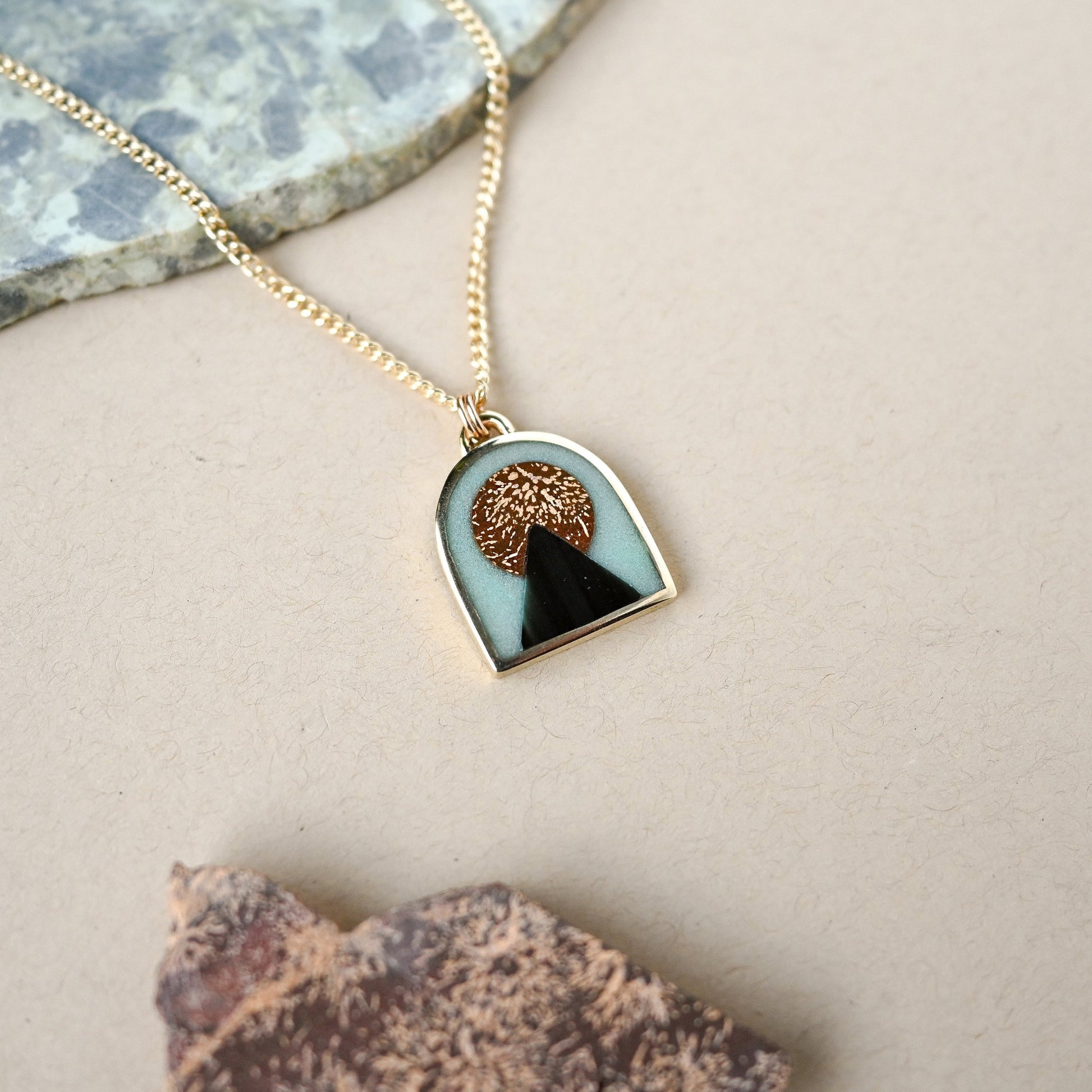 Necklace with a pendant on a neutral background