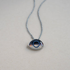 Necklace with a Montana Agate eye pendant set in sterling silver 