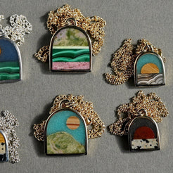 Set of necklaces on a gray background