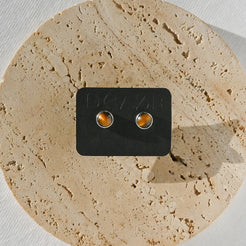 TIGER EYE STUDS ON A BLACK DELZA CARD